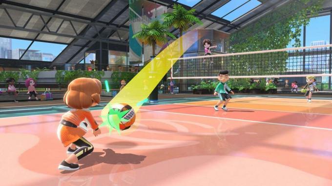Nintendo Switch Sports oyununda voleybol sporu, topu pike yapan bir oyuncu