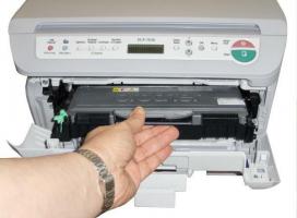 Recenze laserové multifunkční tiskárny Brother DCP-7030