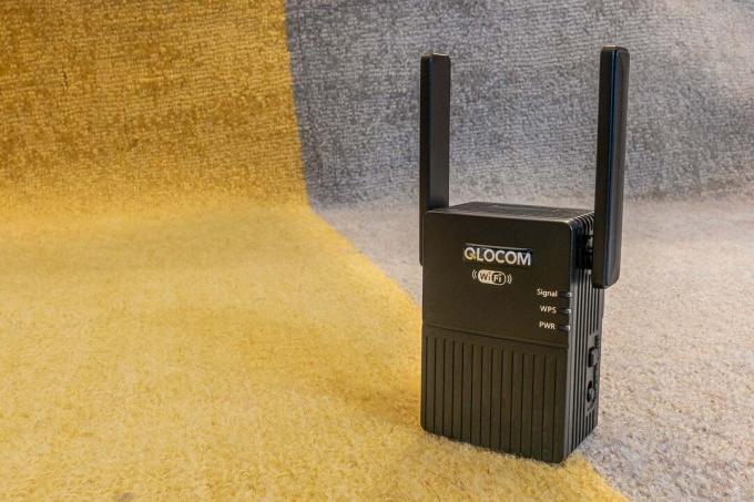 مراجعة Qlocom Wi-Fi Range Extender Booster N300-B-RN1